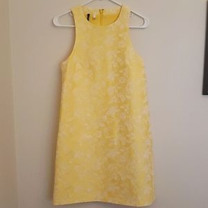 Yellow formal shift dress with white lace detail. Size 6; brand 4C.